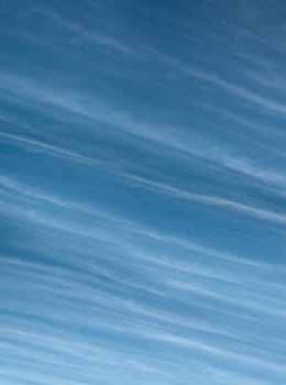 High level Cirrus cloud against blue sky meteorology weather  background