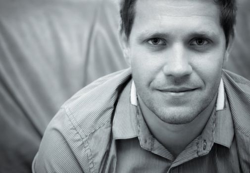 Close up of a businessman with an optimistic and confident face