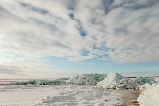 Winter Ladoga Lake. Ice, snow, clouds ... Russia