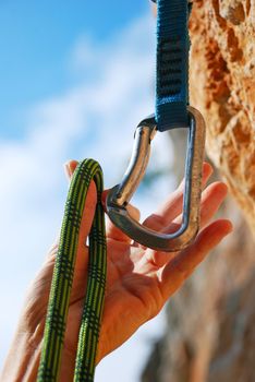 Extreme sport. Rope for climbing and quick-draws