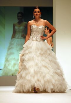 ZAGREB, CROATIA - FEBRUARY 19: Fashion model walks the runway in wedding dress on 'Wedding days' show, February 19, 2012 in Zagreb, Croatia.