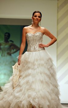 ZAGREB, CROATIA - FEBRUARY 19: Fashion model walks the runway in wedding dress on 'Wedding days' show, February 19, 2012 in Zagreb, Croatia.