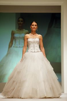 ZAGREB, CROATIA - FEBRUARY 19: Fashion model walks the runway in wedding dress on 'Wedding days' show, February 19, 2012 in Zagreb, Croatia.