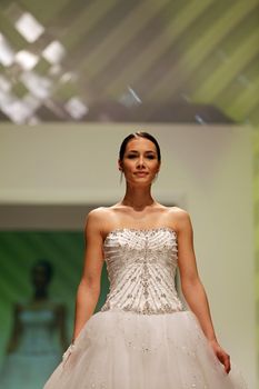 ZAGREB, CROATIA - FEBRUARY 19: Fashion model walks the runway in wedding dress on 'Wedding days' show, February 19, 2012 in Zagreb, Croatia.