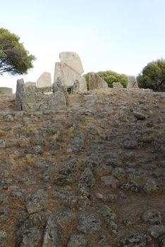 Tomb of the gigants (Tomba dei giganti) at sunset. Sardinia, Italy