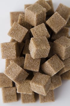 Pile of brown sugar cubes