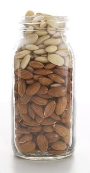 plain and peeled almond in a glass jar