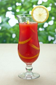 Chilled Orange Lemon Sangria in a summer setting