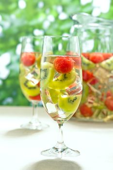 Kiwi Melon Sangria in in a pitcher and in nice colors 