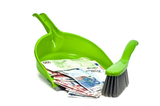 shuffle the money away ith a green dustpan and brush