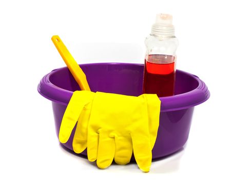 plastic pink sink with cleaning tools islated on white