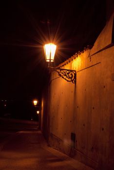 Prague historical street at night.