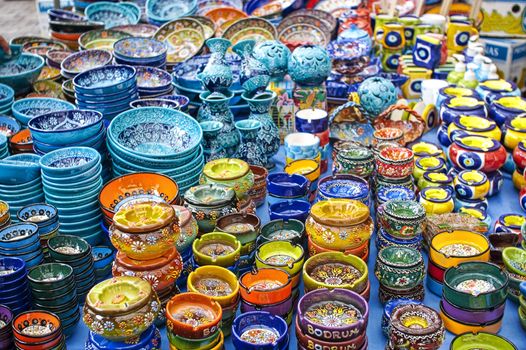 colorful ceramic dishes in the Asian bazaar