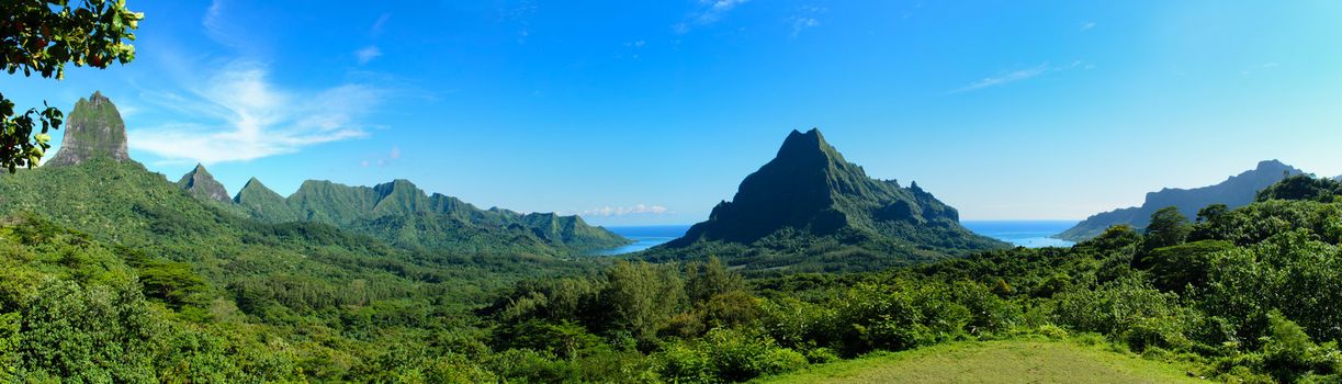 Panorama overview over Rotui mountain with Cook�s Bay and Opunohu Bay on the tropical pacific island of Moorea, near Tahiti in French Polynesia.