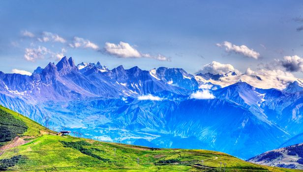 Beautiful landscape with high altitude peaks in The Alps as it can be seen from the mountain pass Madeleine (Col de la Madeleine) in France.