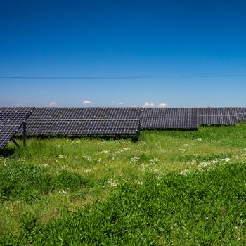 Sunlight as a resource of renewable energy: solar panels on a sunny day