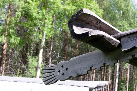 A part of wooden decoration on a house
