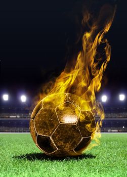 fiery soccer ball on playing field of stadium