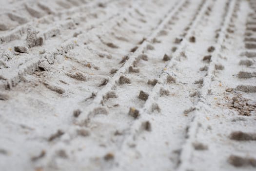 Tire Tracks in the Sand