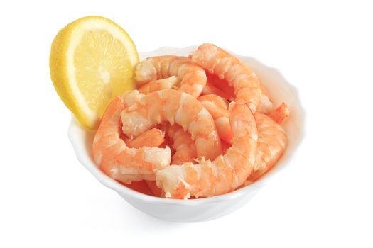 shrimps with sliced lemon in a bowl isolated on white with clipping path