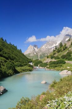 beautiful stream between rocks in Veny valley, Courmayeur. Italy