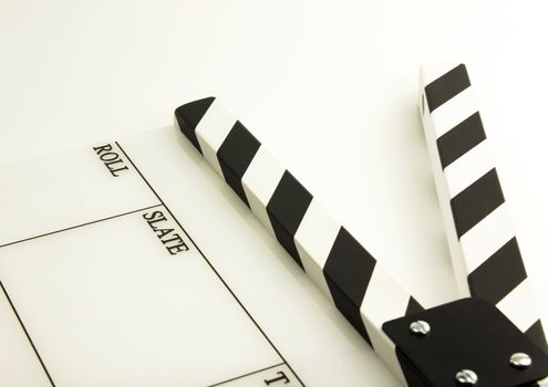 film clapboard with black stripes on white background