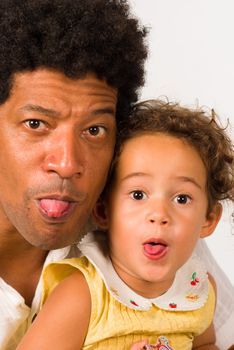 A real naughty dad and daughter sticking out tounge