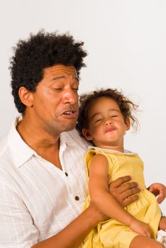 Dad and daughter training for some dramatic acting