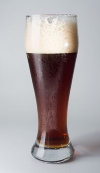 Mug, full of cold ale beer. Isolated.
