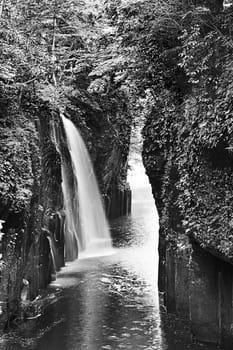 Beautiful gorge Takachiho with a river and waterfall, Japan - Kyushu island. Monochrome
