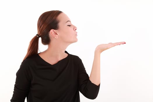 Young beautiful woman holding with flat hand