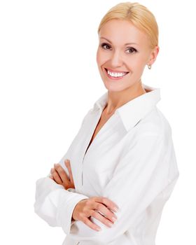 Beautiful young businesswoman standing with hands folded against white background