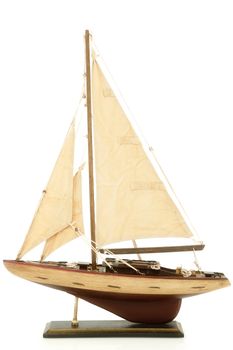 Miniature Replica Sail Ship On Stand Over White