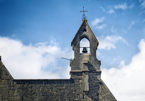 Old Bell tower on top of a church building.