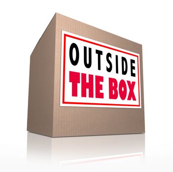 The words Outside the Box on a cardboard package to represent innovation, unconventional and creative thinking in solving a problem or brainstorming