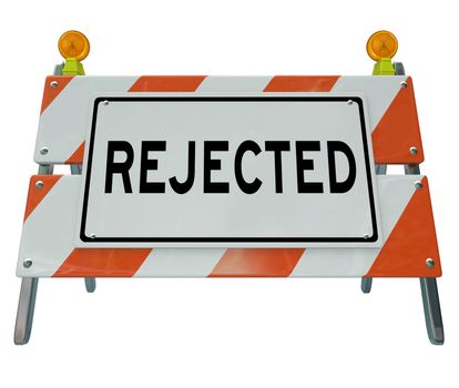 A road blockade or barrier with the word Rejected, communicated a negative message of denial, refusal or being turned down for something you wanted