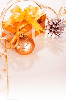 Christmas gift box with decoration on white background