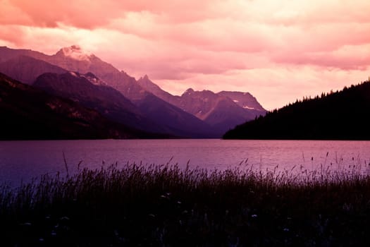 Mountain sunset on the lake