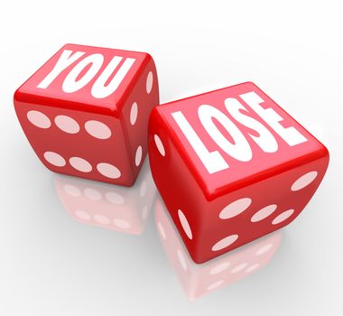 The words You Lose on two red dice symbolizing the 50-50 odds of winning or losing in a game or competition and failure of not being the victor