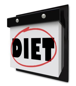 A wall calendar with the word Diet circled by a red marker to remind you of your plan and goal to lose weight and get healthier