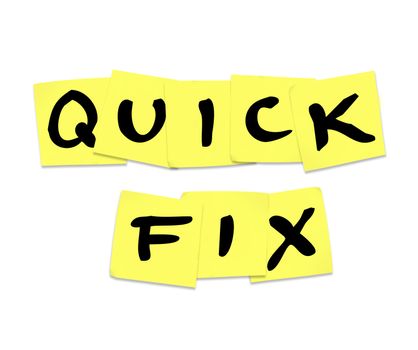 The words Quick Fix written on yellow sticky notes representing a fast solution or answer to an urgent problem or issue