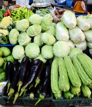 Assorted fruit and vegetable trays in the street market 