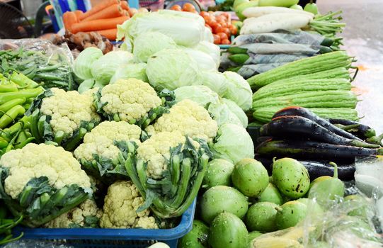 Assorted fruit and vegetable trays in the market, thailand