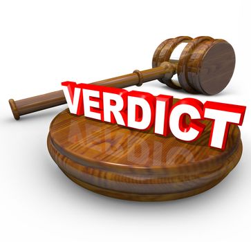 The word Verdict on a wood block with a gavel beside it, representing the final decision, judgment, answer or agreement to resolve a dispute or court case