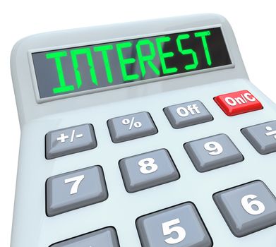 A plastic calculator displays the word Interest as you figure how the percentage interest rate you will pay on borrowed money or the money you will make on investments