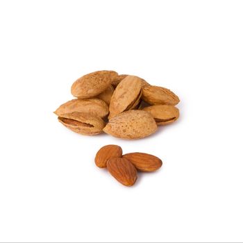 A few raw almonds isolated on white background