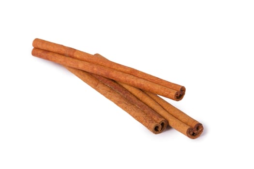 Several cinnamon sticks isolated on white background