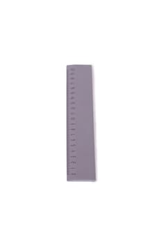 Gray plastic ruler isolated on white background