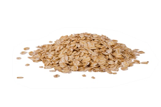 Raw oatmeal isolated on white background close-up