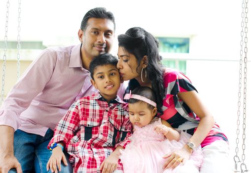 Indian family at outdoor home garden